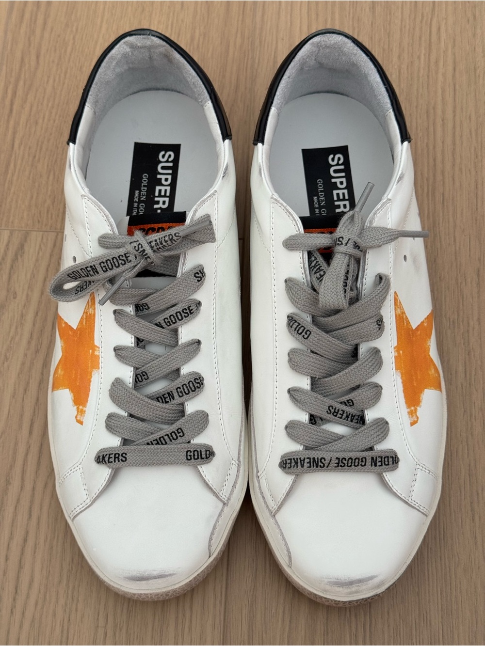 Golden Goose Men’s White Leather Sneakers with Orange Star and Gray Laces